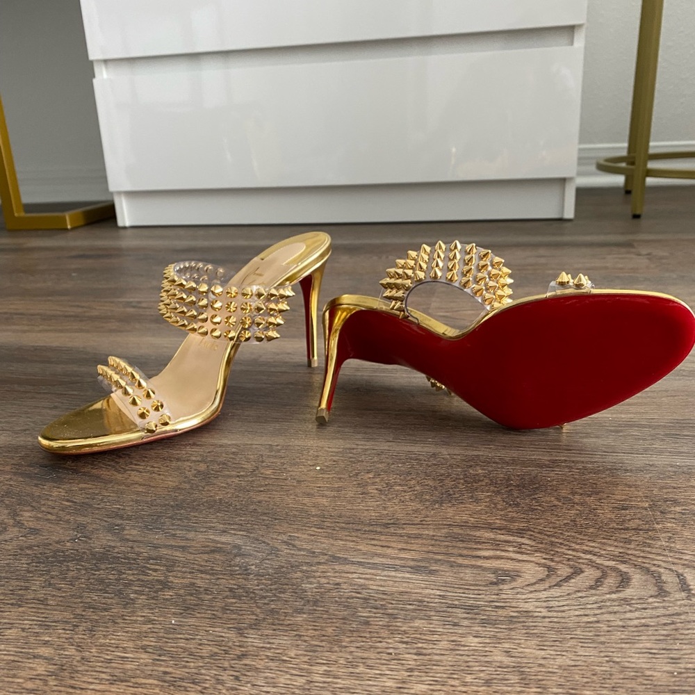 Gold Christian Louboutin heels